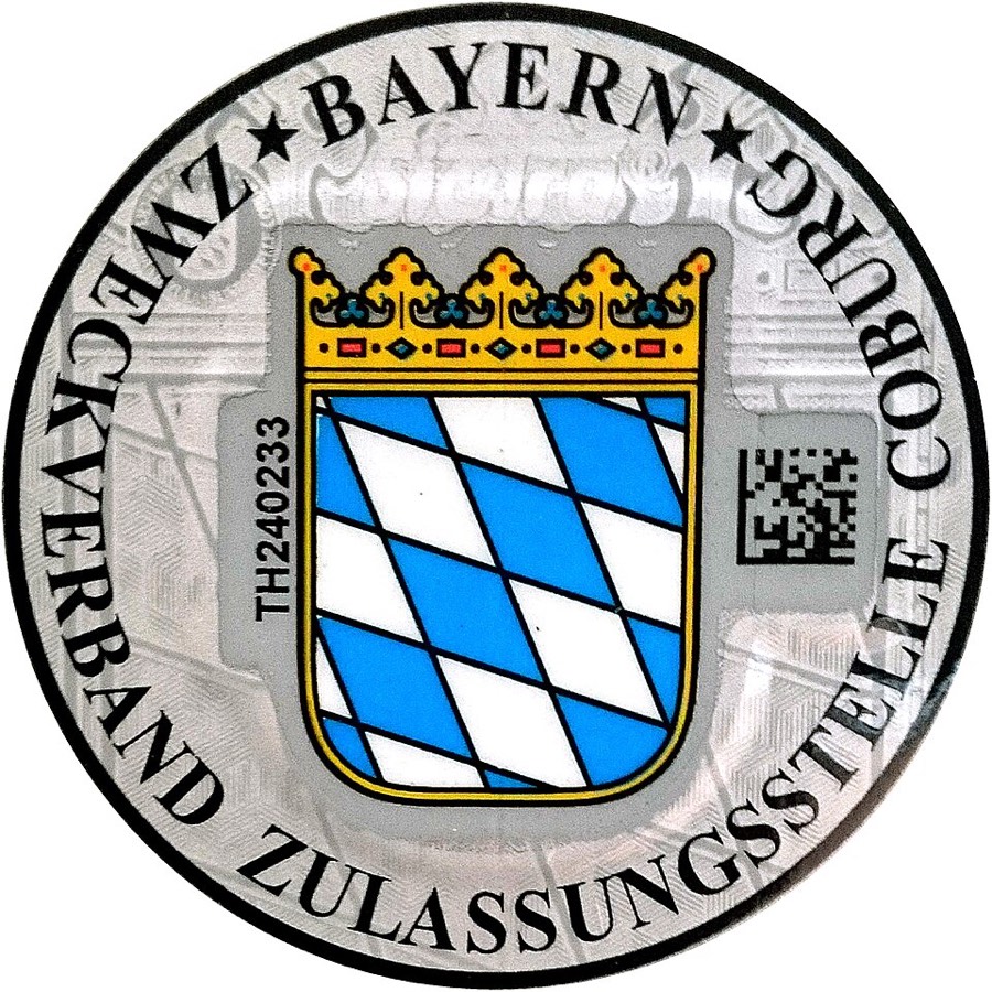 Zulassungsplakette einer Zulassungsstelle mit Wappen und Code